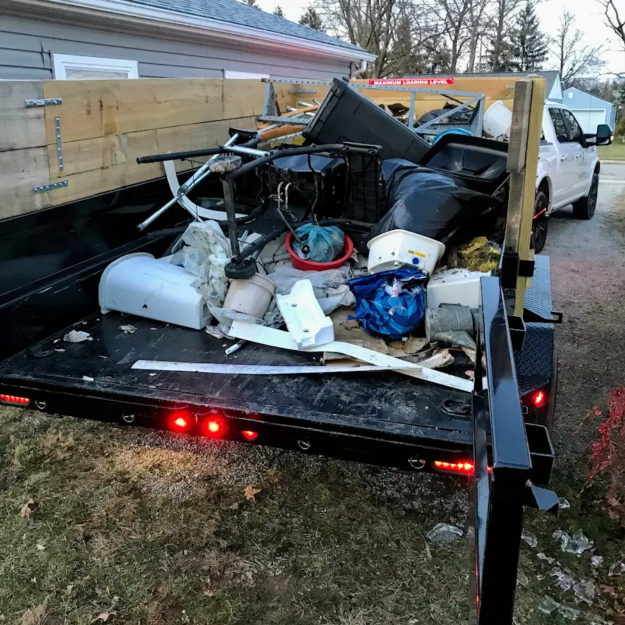 Roll-off dumpster delivered to a residential driveway in Thompson